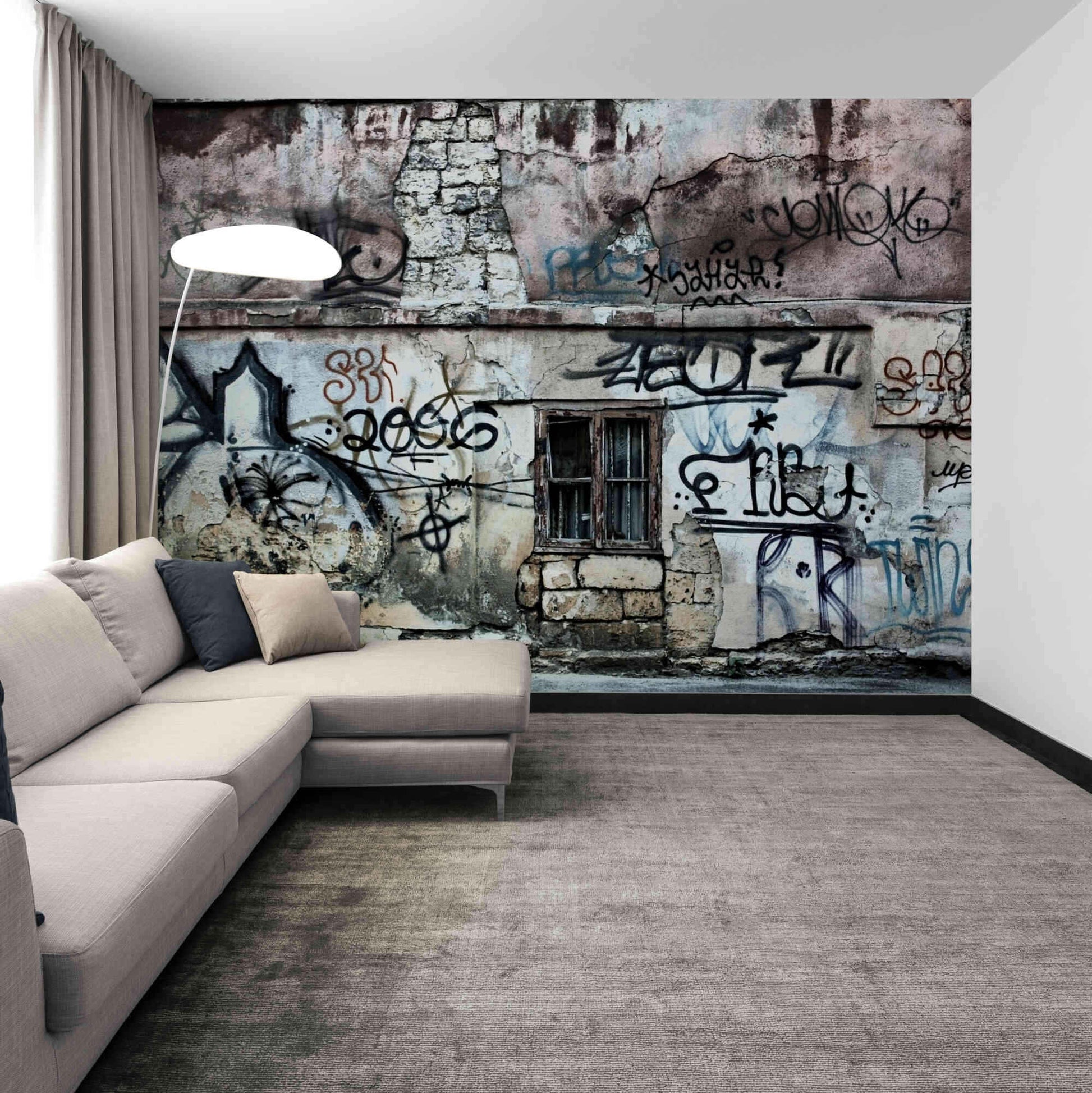 Aged Graffiti Wall" wallpaper showcasing vibrant street art for dynamic interior design.