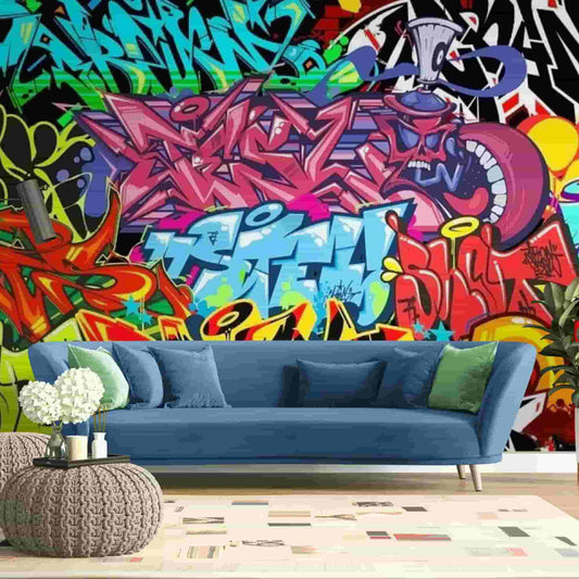 Vibrant and colorful graffiti wallpaper featuring a dynamic array of street art. The design showcases a mix of bold, abstract patterns, expressive lettering, and artistic illustrations, all bursting with a spectrum of bright colors. The lively composition reflects the urban and contemporary art style typical of graffiti, making it perfect for adding a touch of edgy, artistic flair to any room.