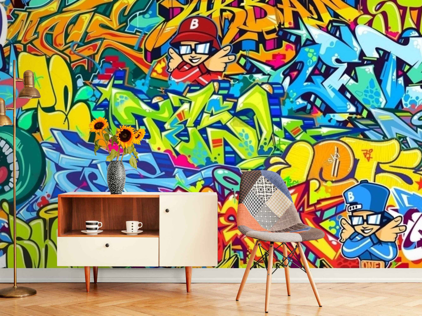 An image of a removable wallpaper with a graffiti design in various colors, including shades of blue, green, orange, and yellow. The design features a mixture of abstract shapes, lines, and splatters, creating a chaotic yet artistic effect. The wallpaper is easy to install and remove, making it a perfect choice for those who want to customize their walls without committing to a permanent solution.
